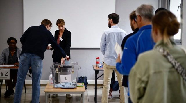 Voters turn out in numbers as France casts ballots in key run-off