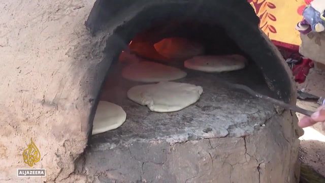 Handmade clay ovens used in Gaza due to lack of electricity