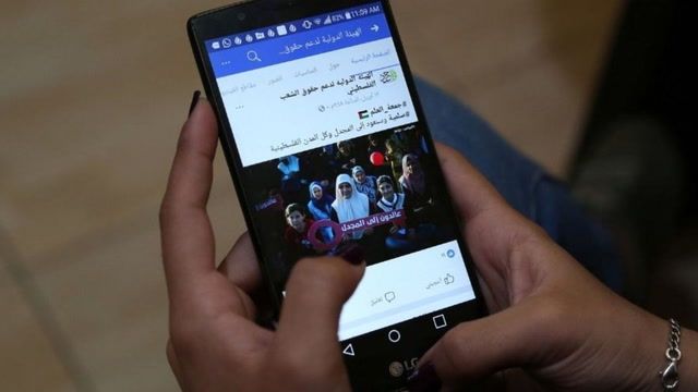 Palestinians accuse social media of restricting posts