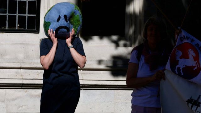 Climate protest groups march through London