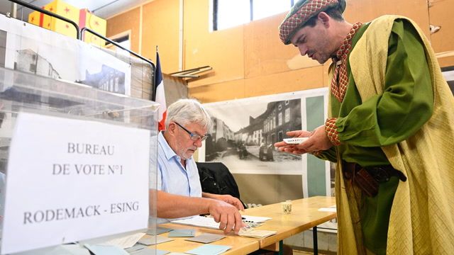 Evening voter turnout in French elections at almost 60%
