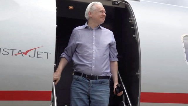 Assange arrives in Australia after guilty plea